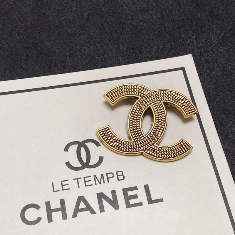 Ch**el brooches